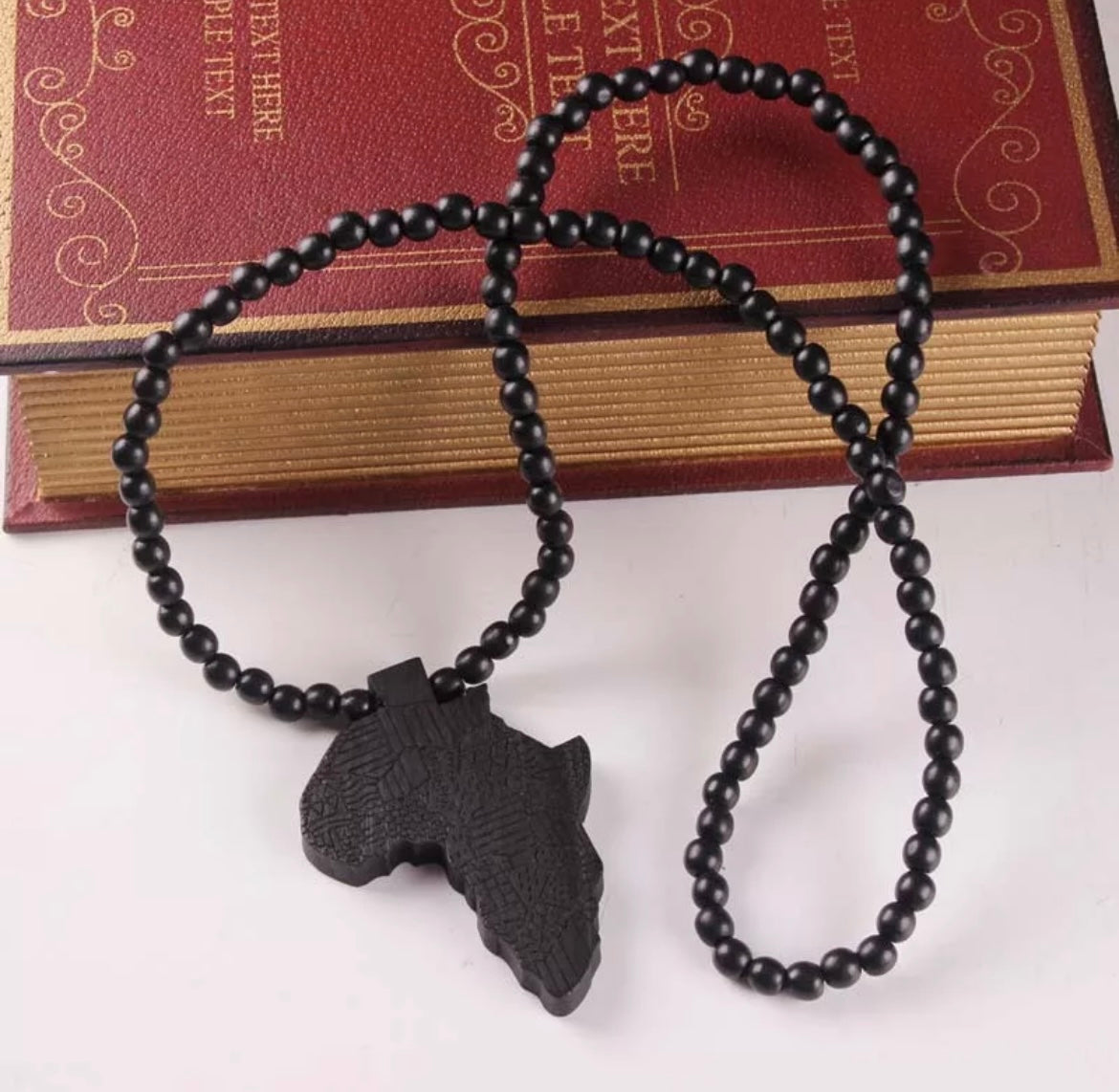 Map of Africa beaded necklace with charm